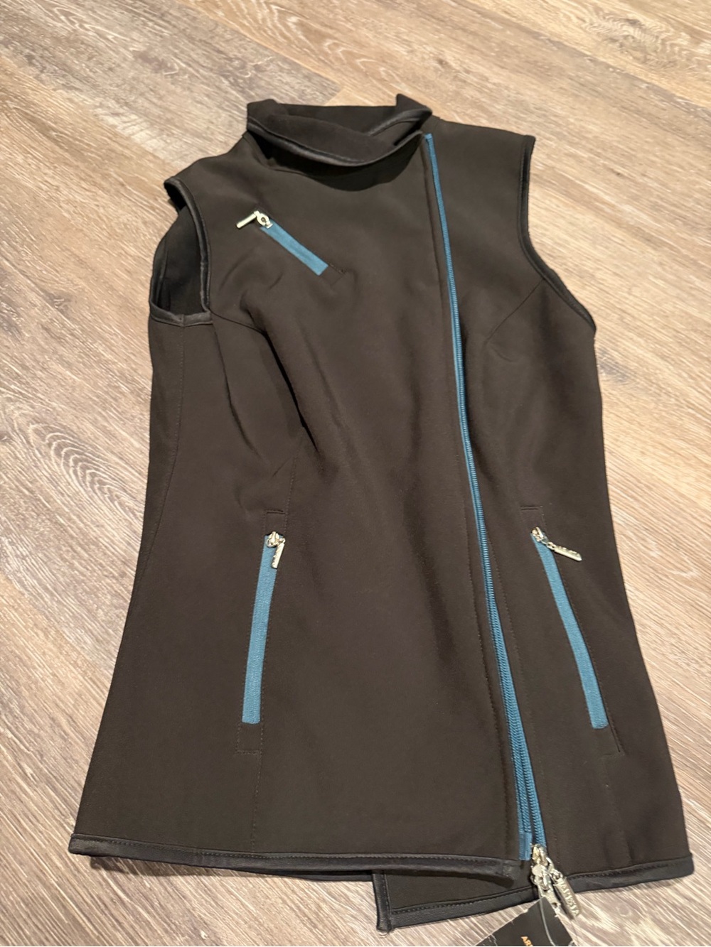Arista Equestrian Women's Black Turtleneck Sleeveless Vest with Blue Zip Accents